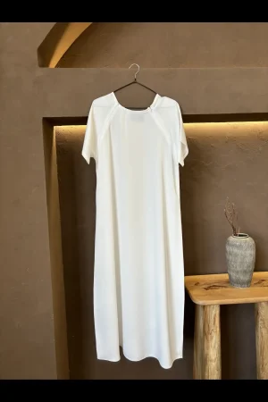 Comfortable off-white breastfeeding inner dress designed to provide easy access and stylish coverage.