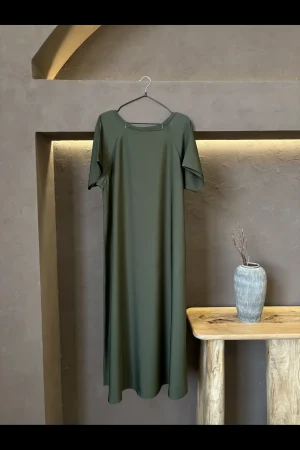 Soft and flowy seaweed green nursing inner dress offering comfort and convenience for new moms.