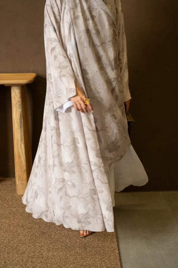 Modern floral print abaya paired with a matching hijab, showcasing effortless modest style.