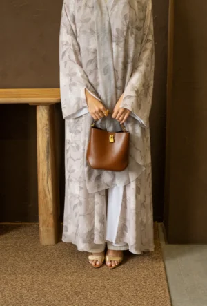 Delicate floral print abaya featuring soft pastel blooms for an elegant, modest look.