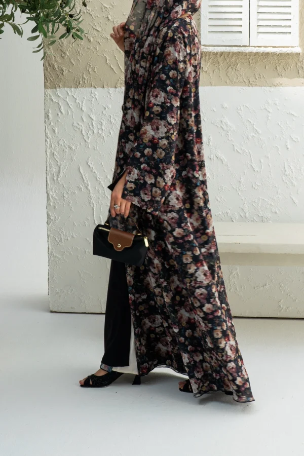 A two-piece floral print dark abaya