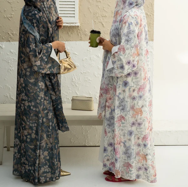 Two models wearing chiffon abaya