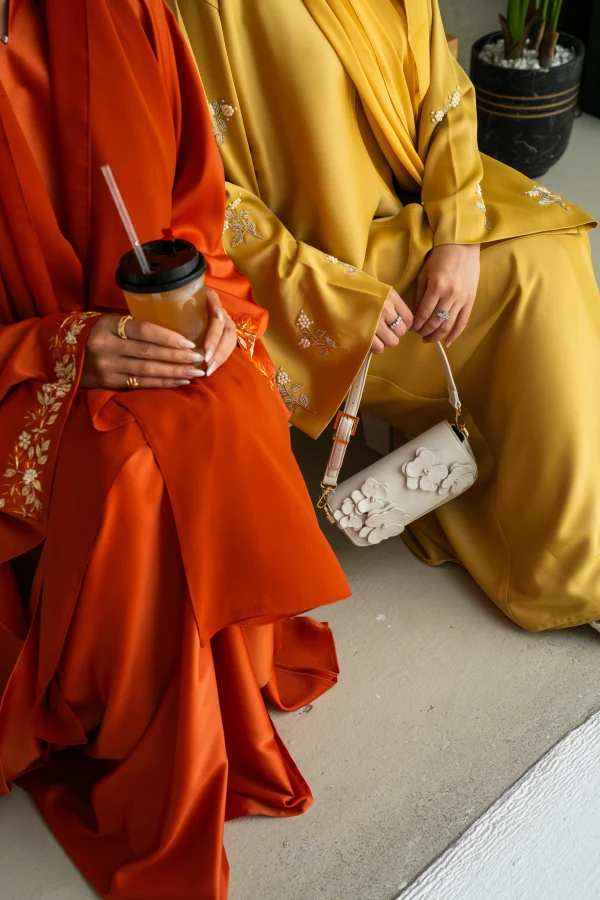A yellow and orange embroidered sleeves