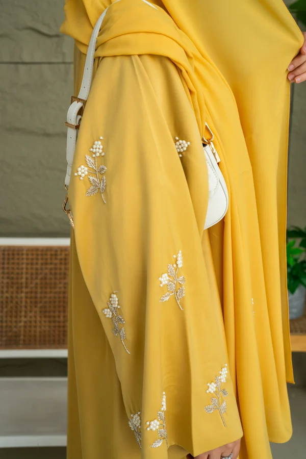 A model's abaya embroidery sleeve